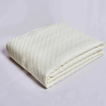 Plain textured bedspread Image