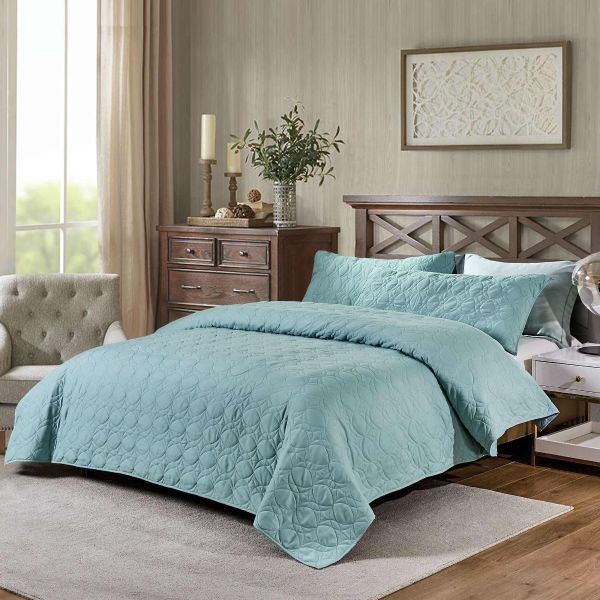 Free Blue Textured bed cover Image