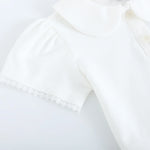 قميص بولو مطرز بأكمام منفوخة للبنات المواليد