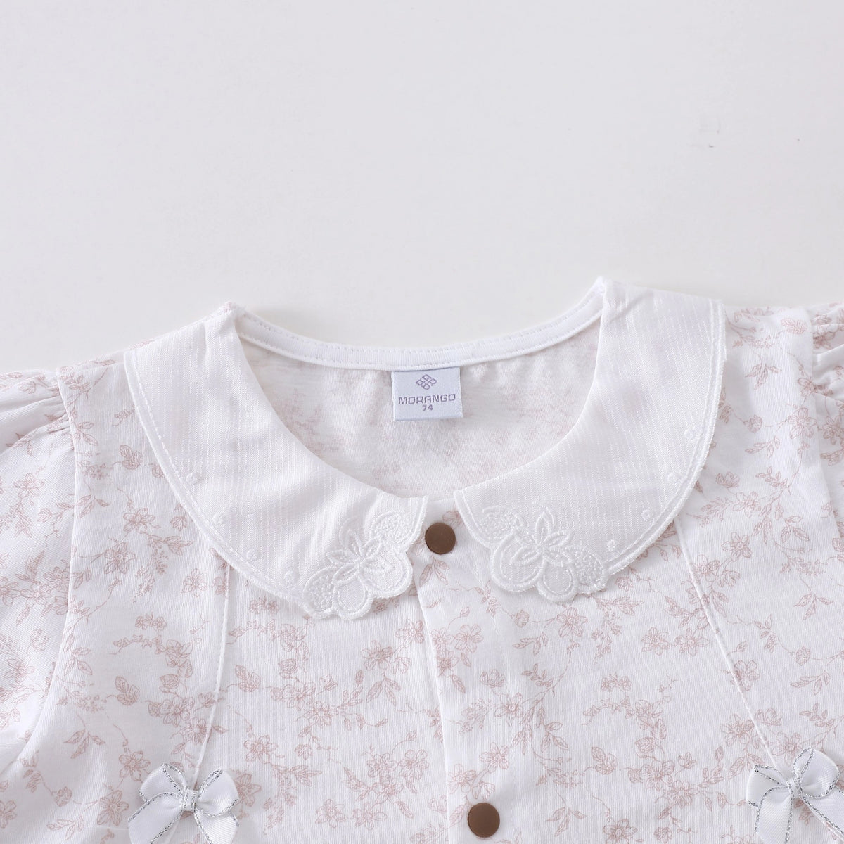 رومبير مزين بزهور للمواليد البنات