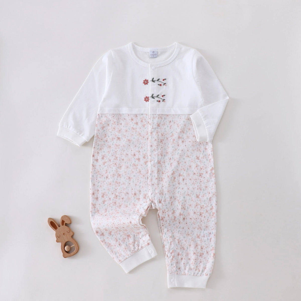 رومبير مزين بزهور للمواليد البنات