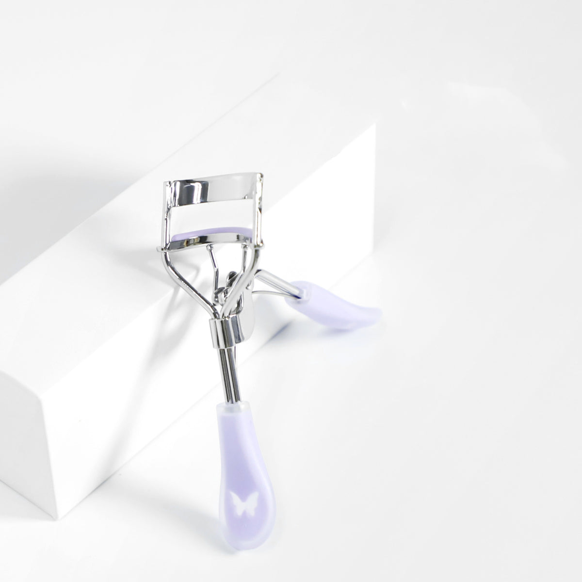 أداة تجعيد الرموش