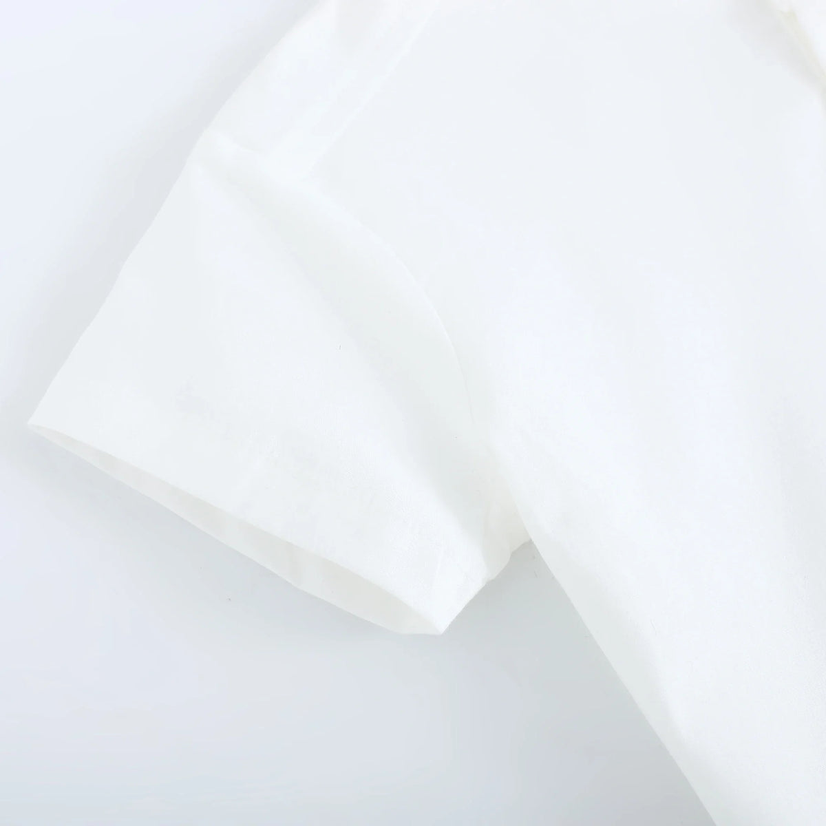 بلوزة مزينة بطباعة للأولاد المواليد 