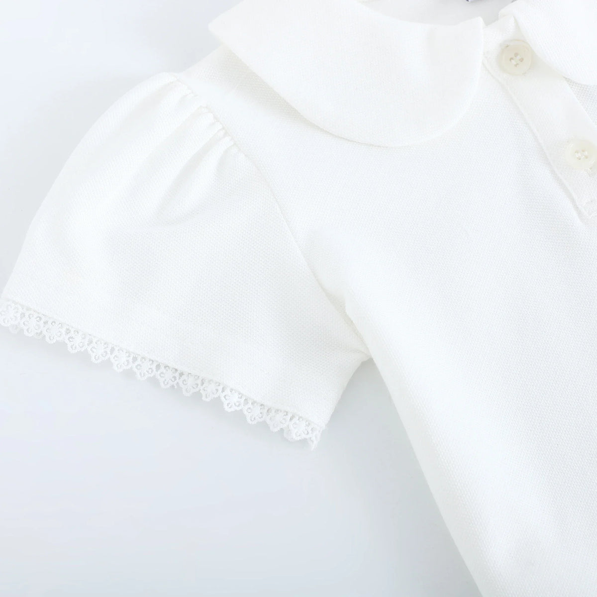 قميص بولو مطرز بأكمام منفوخة للبنات المواليد