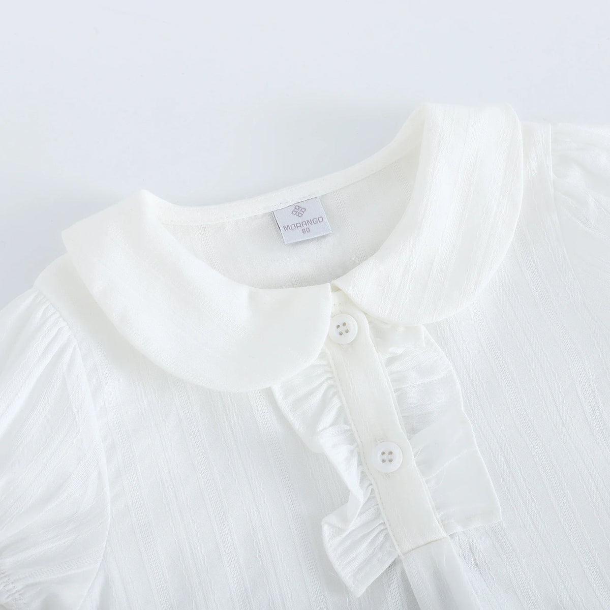 بلوزة بأكمام منفوخ بنقشة الجاكار للبنات المواليد