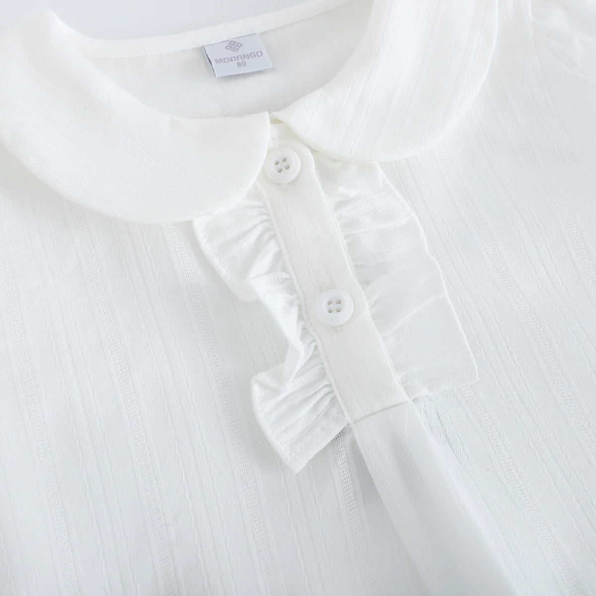 بلوزة بأكمام منفوخ بنقشة الجاكار للبنات المواليد