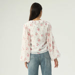 بلوزة بنمط الزهور للنساء