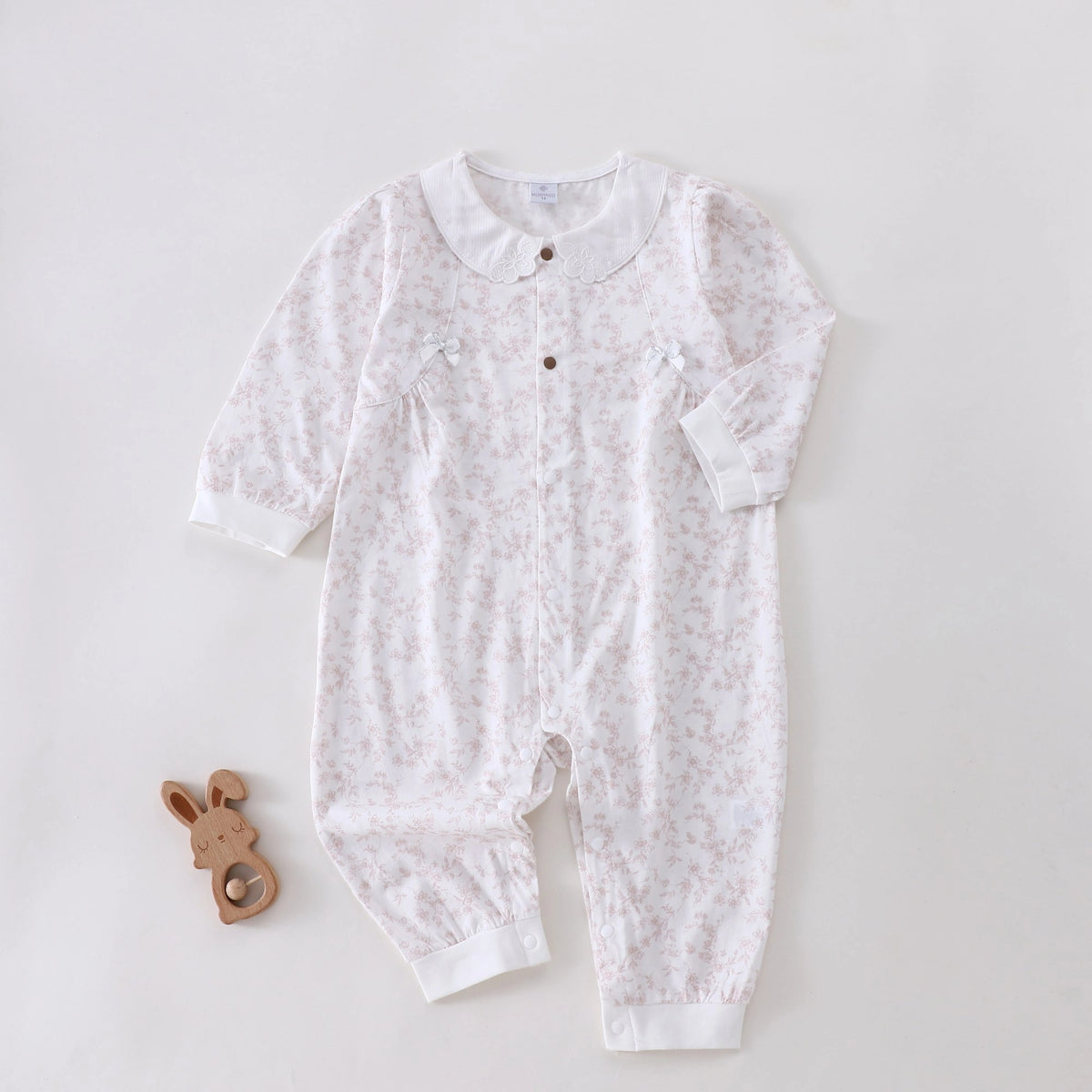 رومبير مزين بزهور للمواليد البنات