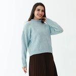 Elegant Solid Sweater for Women Image