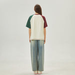 تيشيرت بألوان متداخلة بإطلالة عصرية للنساء