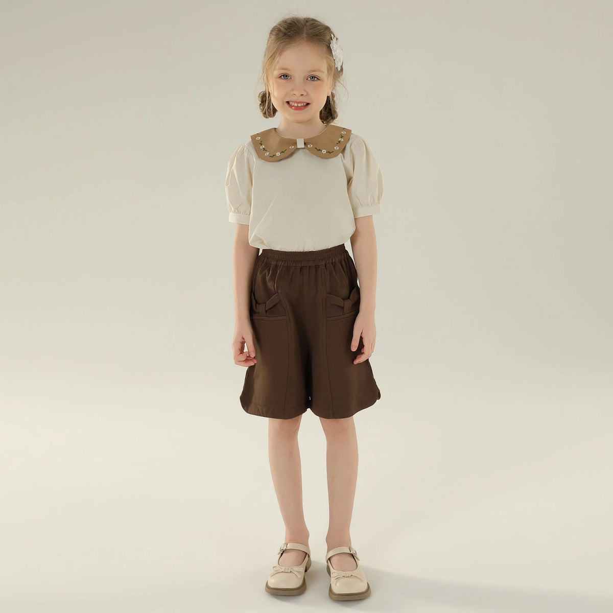 بلوزة بأكمام منفوخة بنقشة الزهور للبنات