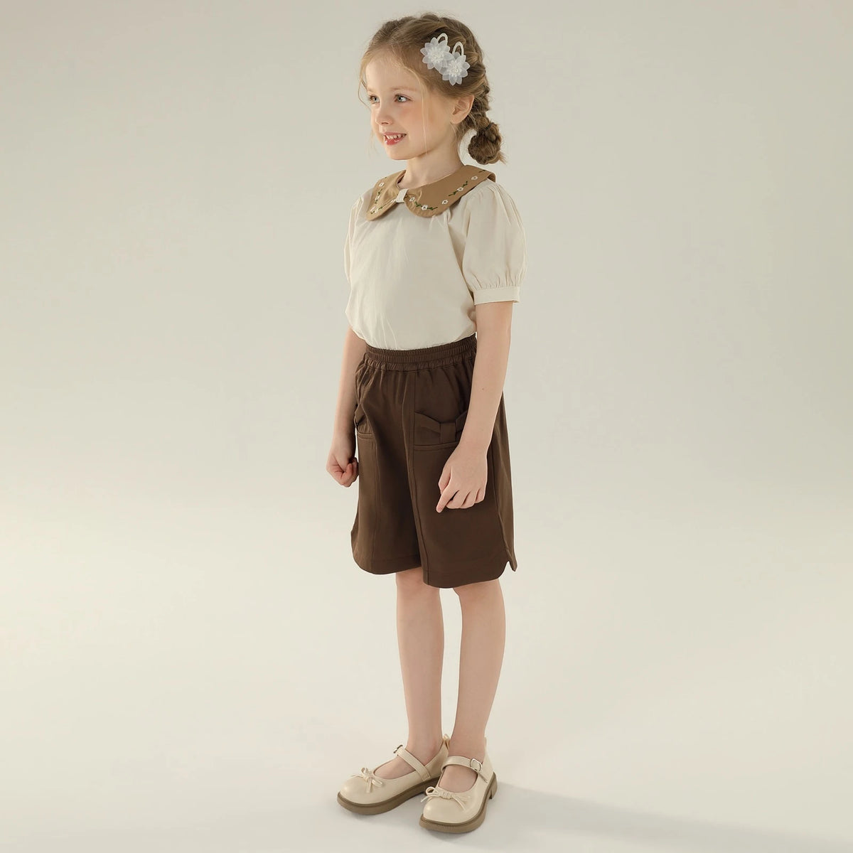 بلوزة بأكمام منفوخة بنقشة الزهور للبنات