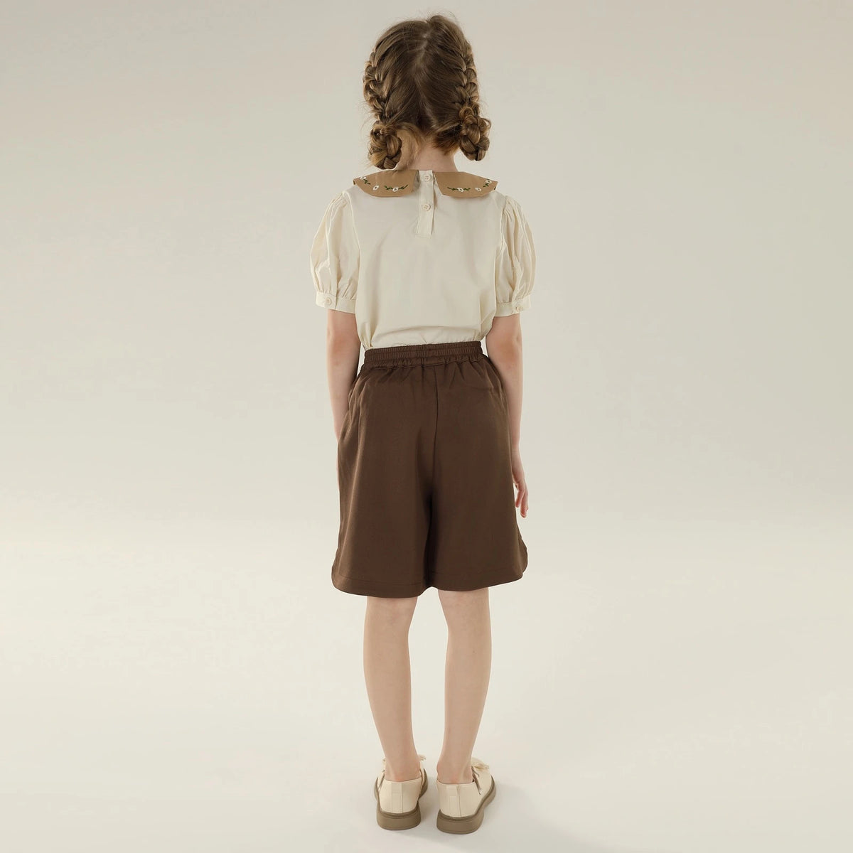 بلوزة بأكمام منفوخة بنقشة الزهور للبنات