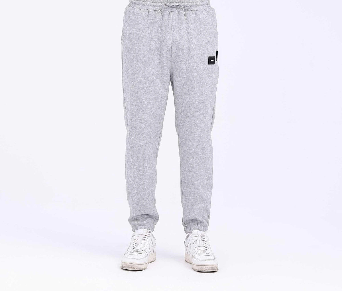 badge casual pants for men image