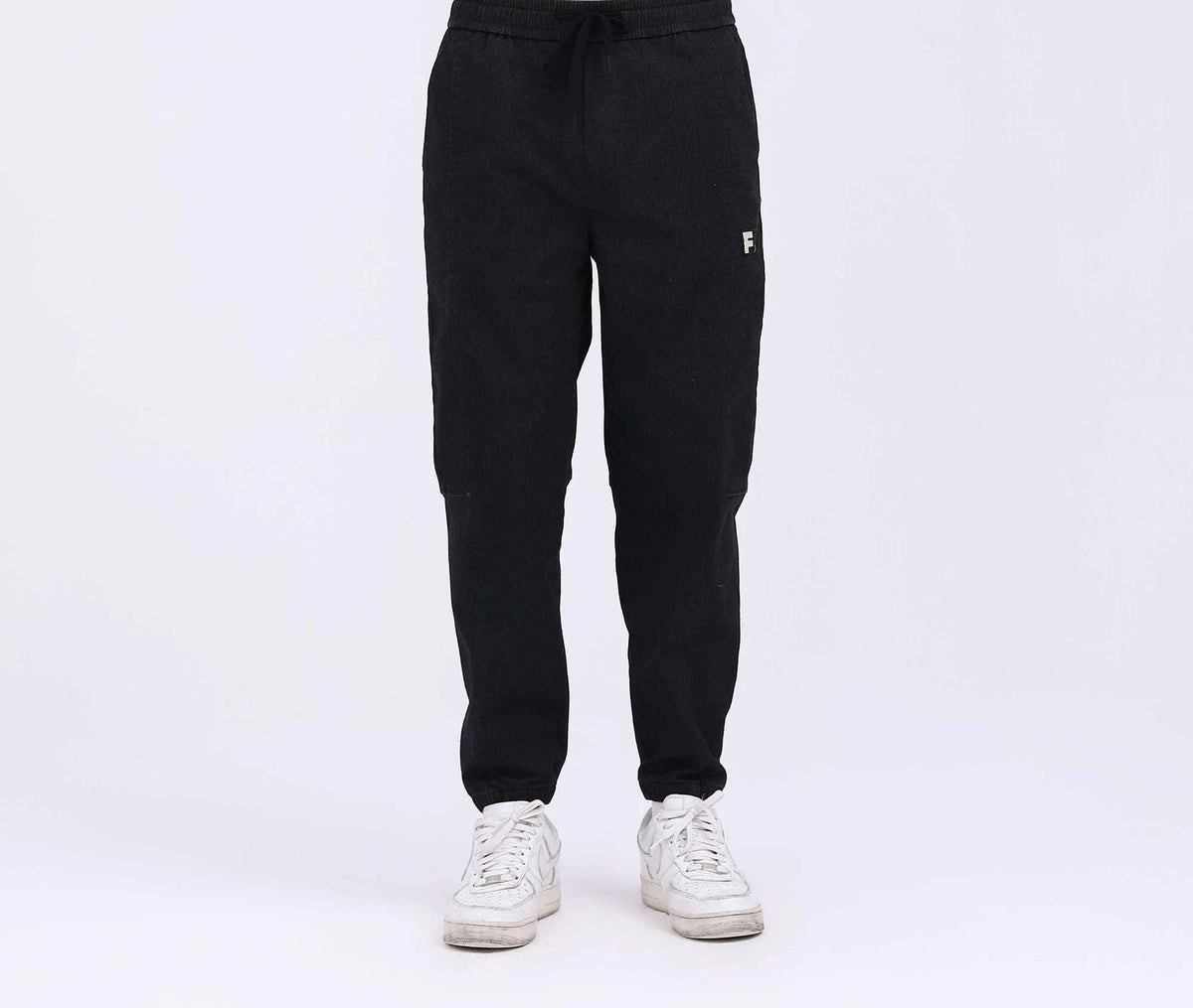 badge casual pants for men image