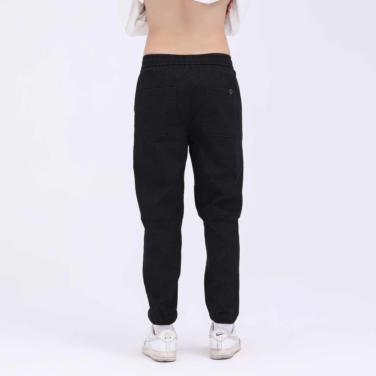 badge casual pants for men image